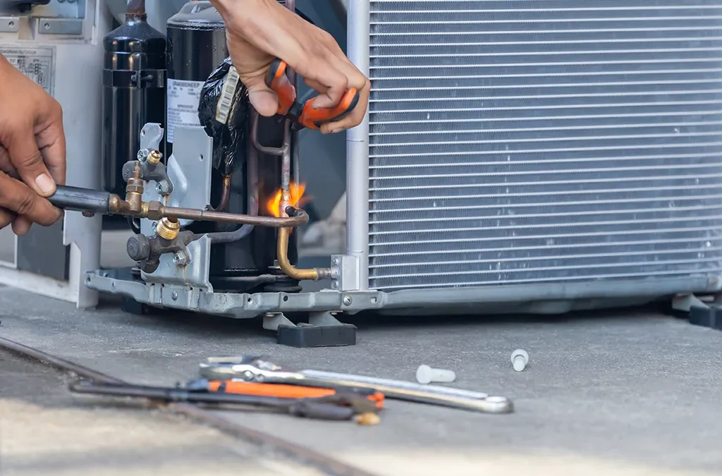 Outdoor air conditioning unit at a Florida home during summer heat